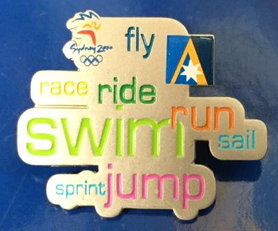 LAPEL BADGE: "Run Swim Jump etc" (image for) LAPEL BADGE: "Run Swim Jump etc"