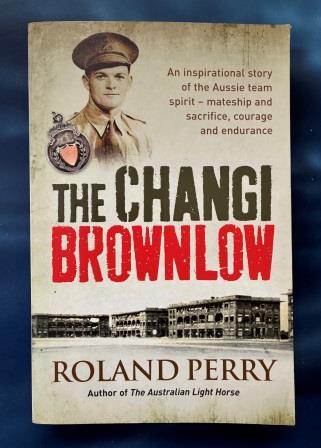 PAPERBACK NOVEL: "The Changi Brownlow - by Roland Perry" (image for) PAPERBACK NOVEL: "The Changi Brownlow - by Roland Perry"